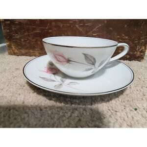 97.  Cup and Saucer Set